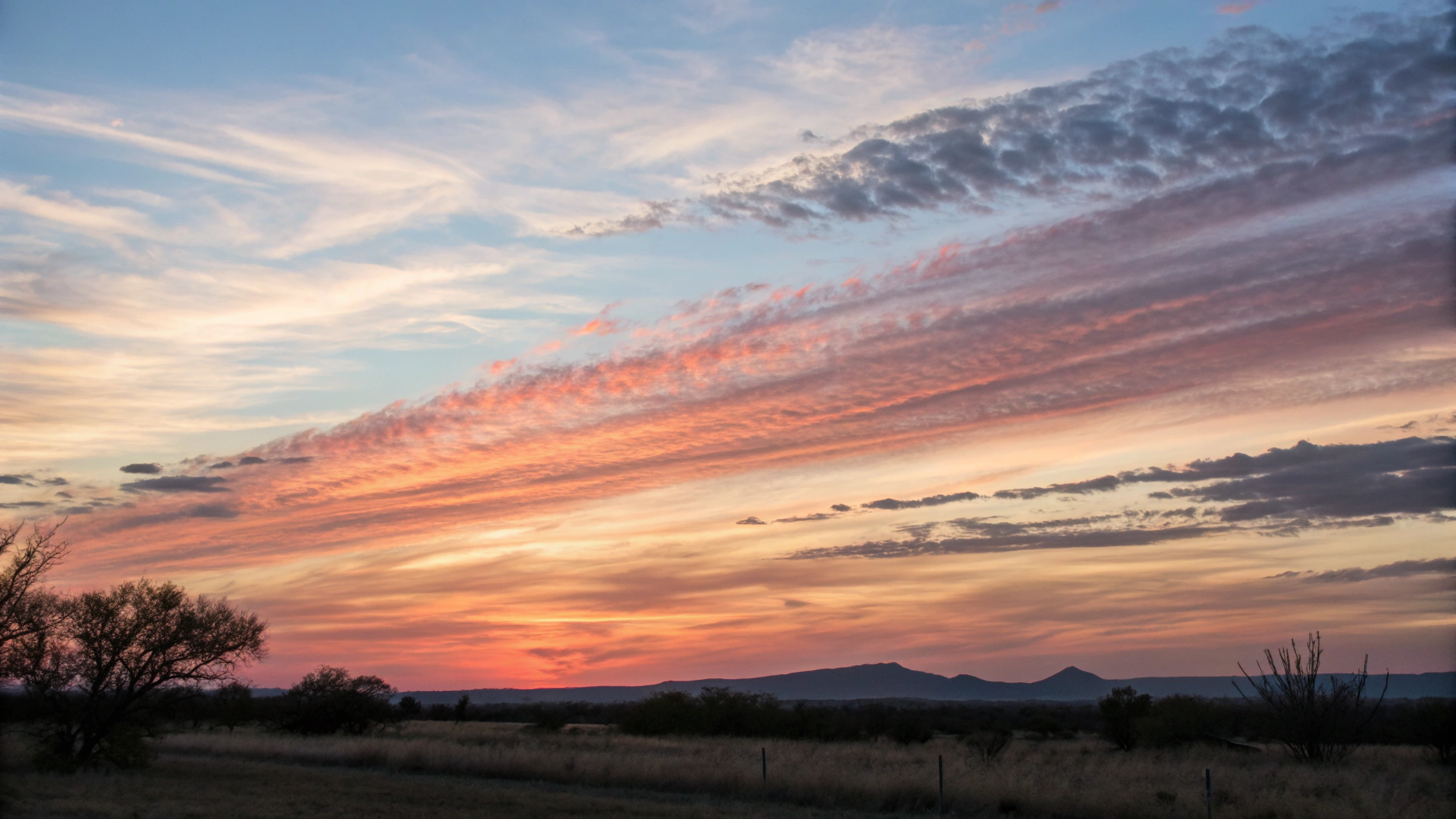 Dramatic cloud formations painted by the setting sun